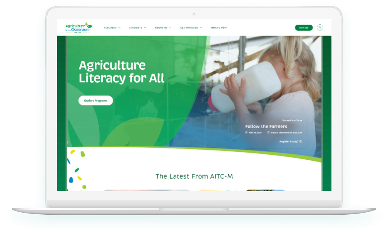 Non-profit organization website - AITC-MB Homepage on Laptop