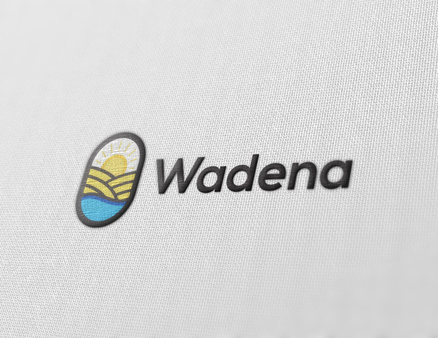 Abstract logo presented to the town of Wadena