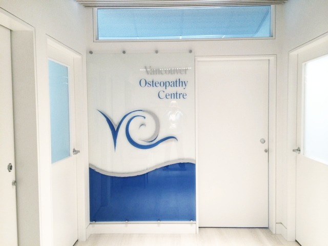 The VOC glass door design outside of their office in Vancouver, BC