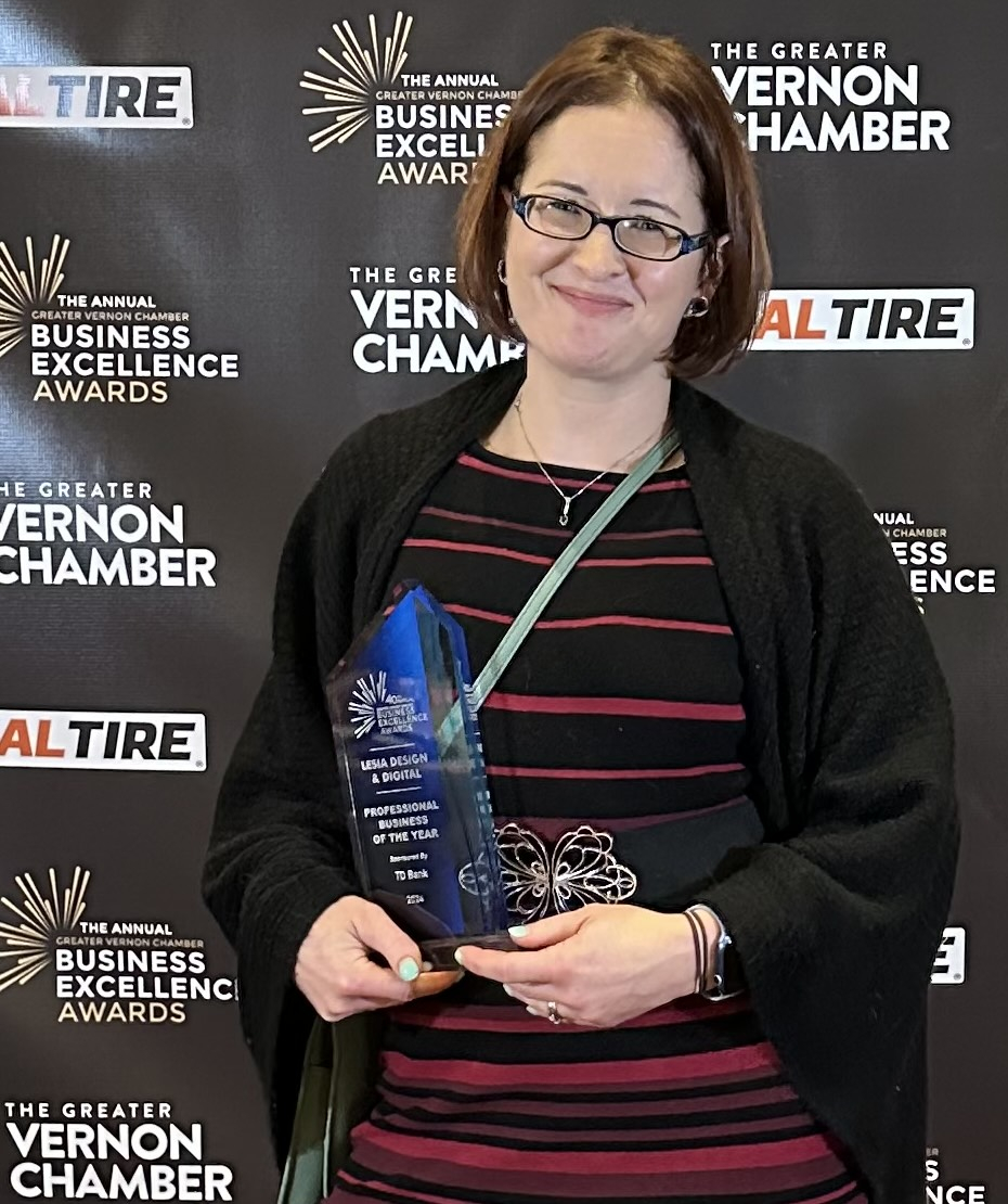 lesia-award Lesia posing with the Professional Business of the Year trophy at the Vernon Chamber of Commerce Business Excellence Awards night