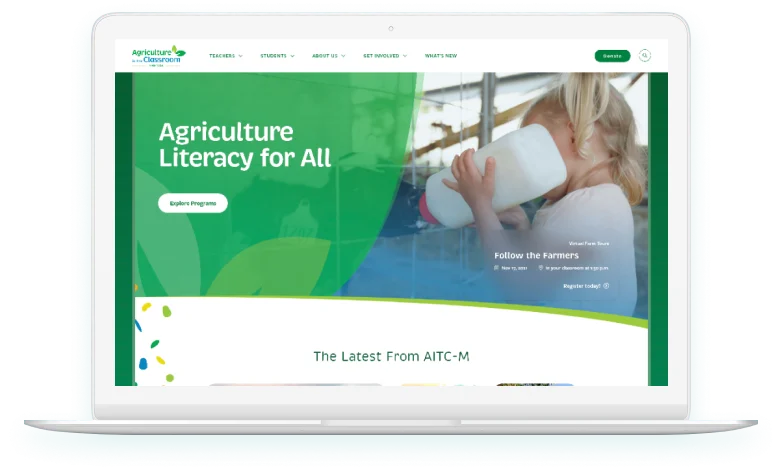Non-profit organization website - AITC-MB Homepage on Laptop